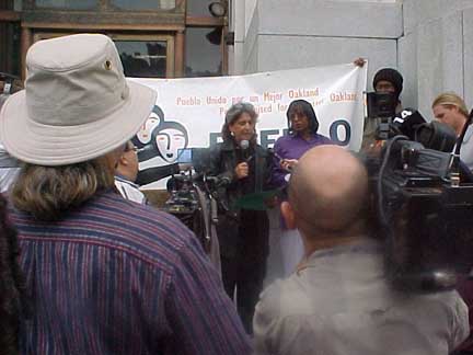 nancy nadel speaking at rally